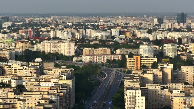 Buildings of Bucharest. Aerial 4K video with old apartment buildings from Crangasi and Militari neighbourhoods and other main roads and bridges of the city. Travel to Romania.