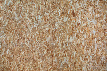 Obraz premium Wood texture background. Wooden pressed shavings. Texture wood use for table, floor, sign, wall, panels, board, door, box.