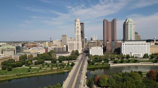 Inspiring 4K aerial view of downtown city with a river and business buildings in Columbus Ohio