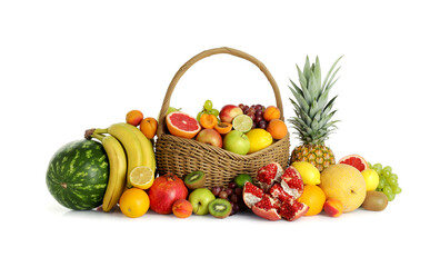 Many different fresh fruits in wicker basket isolated on white