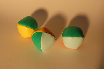 Juggling balls on a white background