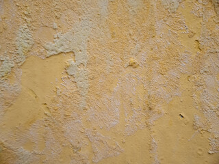 Abstract​ yellow color of​ surface​ wall​ concrete​ for​ vintage​ background. ​texture​ damaged​ to surface​ wall. Wall​ texture​ for​ background.