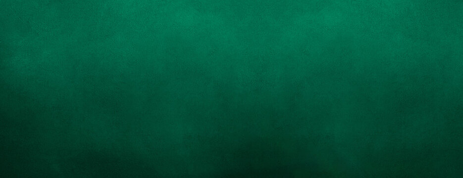 A dark Green, grunge-textured background with a rough, grainy concrete wall surface. Green abstract texture background. empty copy space for text, wall structure, grunge canvas. luxury Blue grunge