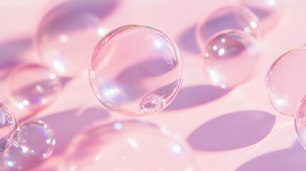 Fototapeta premium Floating bubbles casting shadows on a pastel rose background.
