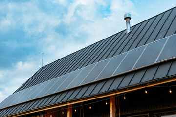 Modern cabin roof using solar panels for renewable energy