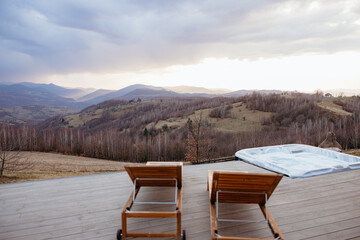 Enjoying a relaxing evening in a mountain cabin hot tub