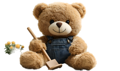 a teddy bear holding a broom. 