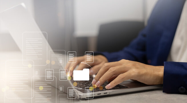 close up employee  businessman hand show virtual icon of DMS (document management system) while sitting at private office room to using database in enterprise for modern technology business concept