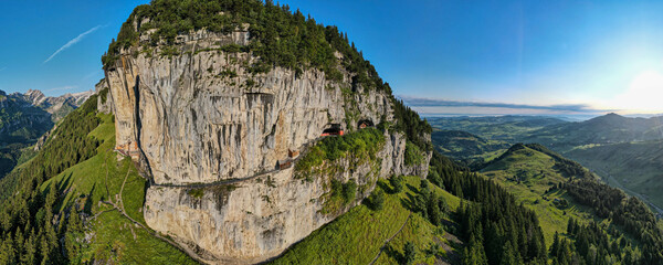 Drone view at the famous mountain guesthouse Aescher at Ebenalp in the Swiss alps