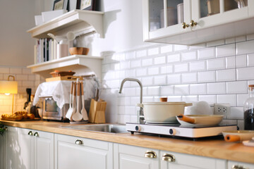 Kitchen and kitchenware decorated in a minimalist style.