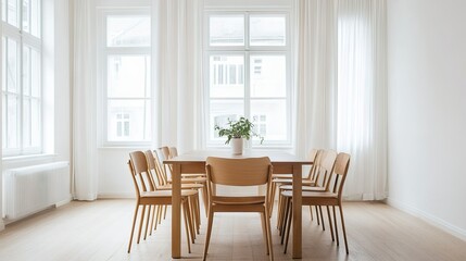 Fototapeta premium Minimalist dining room with a simple wooden table and chairs, white walls, and an uncluttered layout. The space around allows for clean copy placement.