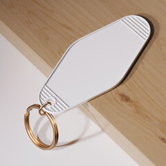 Plastic keychain on the wooden surface mockup. 3D rendering