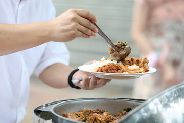 Food Buffet Catering Dining Eating Party Sharing Concept.people group catering buffet food indoor in luxury restaurant with meat colorful fruits and vegetables