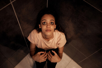 Woman, paranoid and stress for scared, hallucination and trauma in house with insomnia, crisis and...
