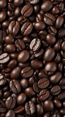 Obraz premium Close-up of dark roasted coffee beans vertical background. Detailed texture of coffee beans for food and drink concepts