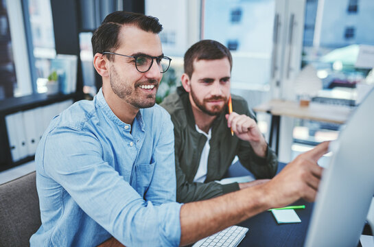 Creative, men and helping with computer in office for internship, technical assistance and article feedback. Above, people and mentor with pc for news planning, journalism support and agency growth