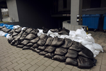 Wall of sandbags protecting underground parking in Poland