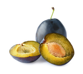 Whole and cut plum isolated on white