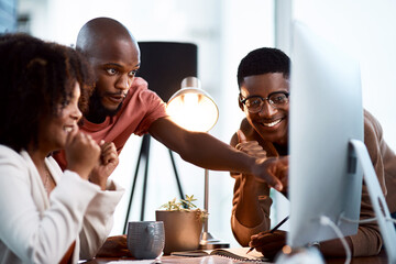 Business, people and celebration at computer in office at night for stock market profit, IPO launch and bonus. Professional, trading teamwork and victory fist at desk for financial investment revenue