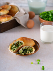Delicious and flavorful Spinach and Egg Pastries made with Milk and Green Onions
