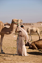 Fototapeta premium woman in the desert, fashion shooting in Morocco