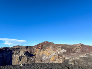 Expansive Volcanic Crater Under Clear Blue Sky