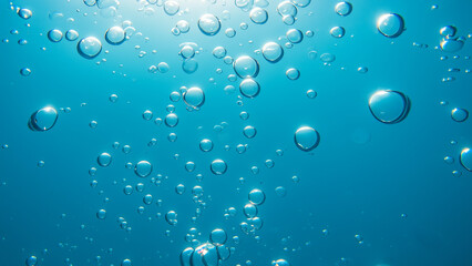 Bubbles Underwater Background in Clear Blue Ocean