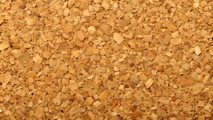Natural cork granules, neutral mood, textured background, warm tones, copy space