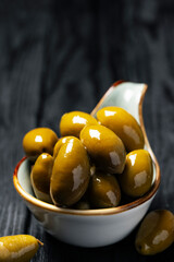 close up green olives, restaurant food concept
