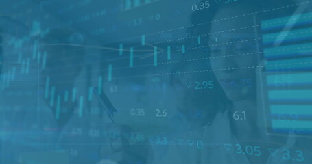 Image of financial data processing over diverse business people in office