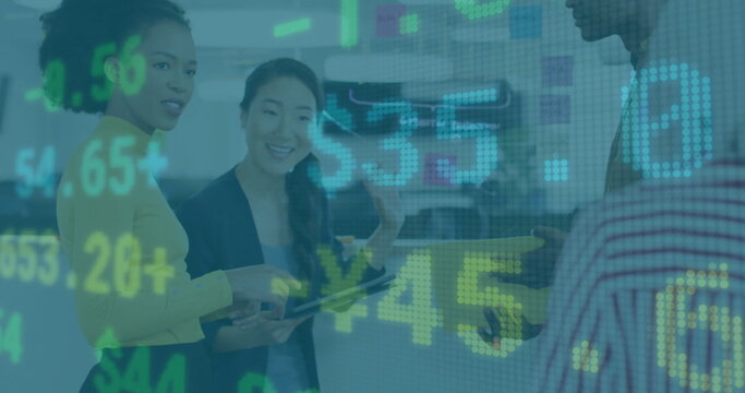 Image of financial data processing over diverse business people in office - Powered by Adobe