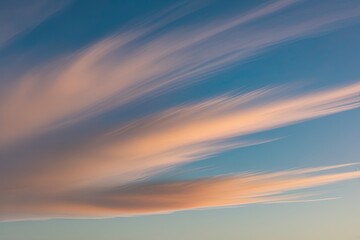 Light Gradient Variations in Wispy Clouds: A Scenic Display of Colors and Design