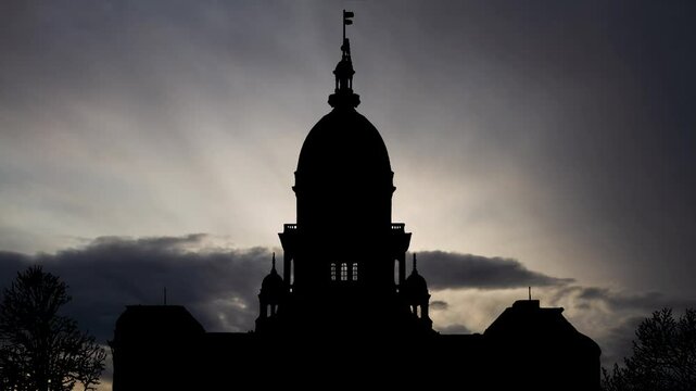 Springfield at Sunrise, Time Lapse  with Fast Clouds and Dark Silhouette of State Capitol Building of Illinois, USA