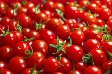 Background of red cherry tomatoes.