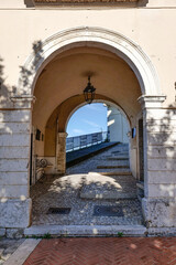 A narrow street between the old houses of Picinisco in Lazio, Italy.