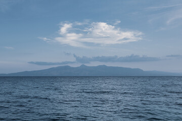 Very beautiful coastline on the Ionian Sea in Albania. The beach with fine sand in the mountains of Albania. Vacation at the sea.
