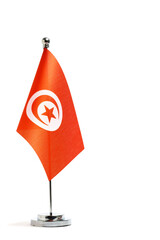 Tunisia flag on flagpole isolated on white background.