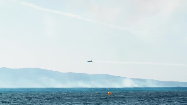 Tricolor Arrows Planes acrobatic show non the ocean