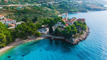 Discover the breathtaking beauty of Brac Island, where vibrant greenery meets azure waters. A...