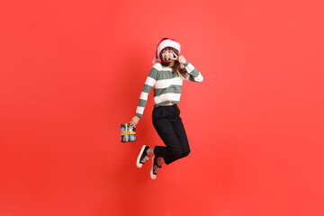 Woman wearing Santa hat