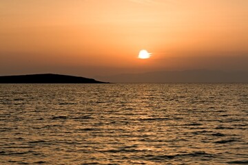 View of the Ionian Sea from Kato Nisi Beach at sunset. Elafonisos Island. Laconia, Peloponnese, Greece.