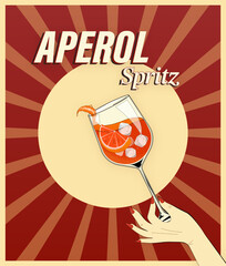 Woman hand holding glass of spritz cocktail with orange slice on pop art background