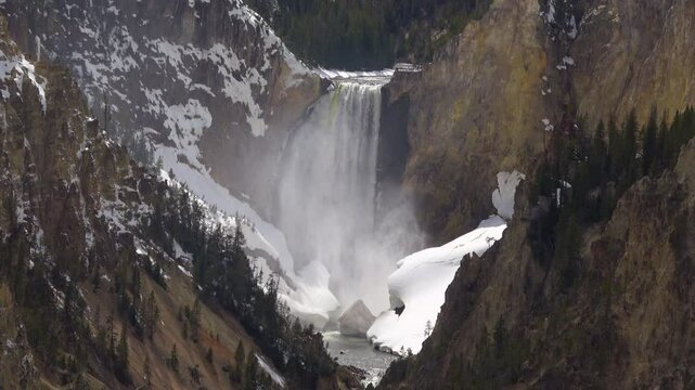 Cinematic shot of scenic landscape at Lower Yellowstone River Falls in Yellowstone National Park, USA