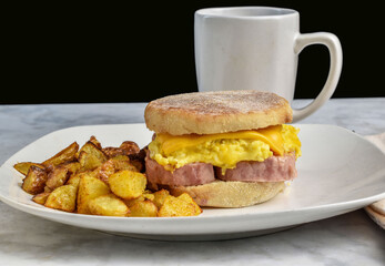 breakfast sandwich served with  home fries