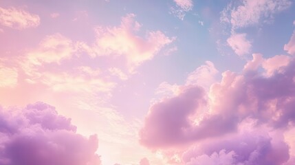 Fototapeta premium ethereal pastel sky with fluffy cotton candy clouds at sunset soft pink and lavender hues blending seamlessly creating a dreamy atmosphere