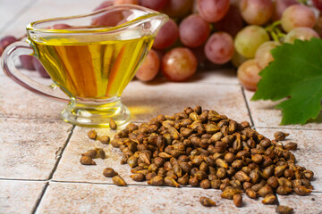 Close-up of grape seeds and grape seed oil.