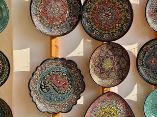 2024 August 17 - Tashkent, Uzbekistan: Display of Traditional Ceramic Plates