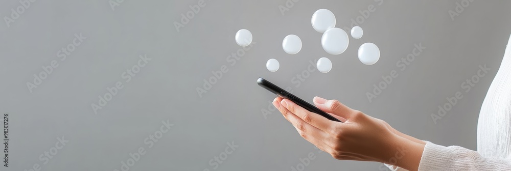 Poster Person sending messages through a smartphone, showcasing floating message icons. Concept of staying connected digitally.