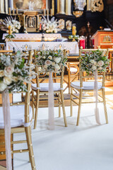 wedding decorations in a catholic church