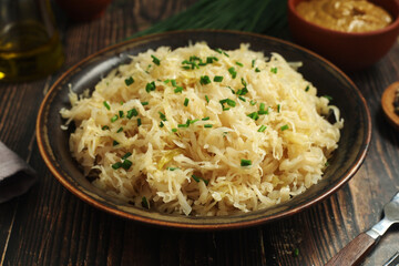 A bowl with traditional German Sauerkraut served in rustic style